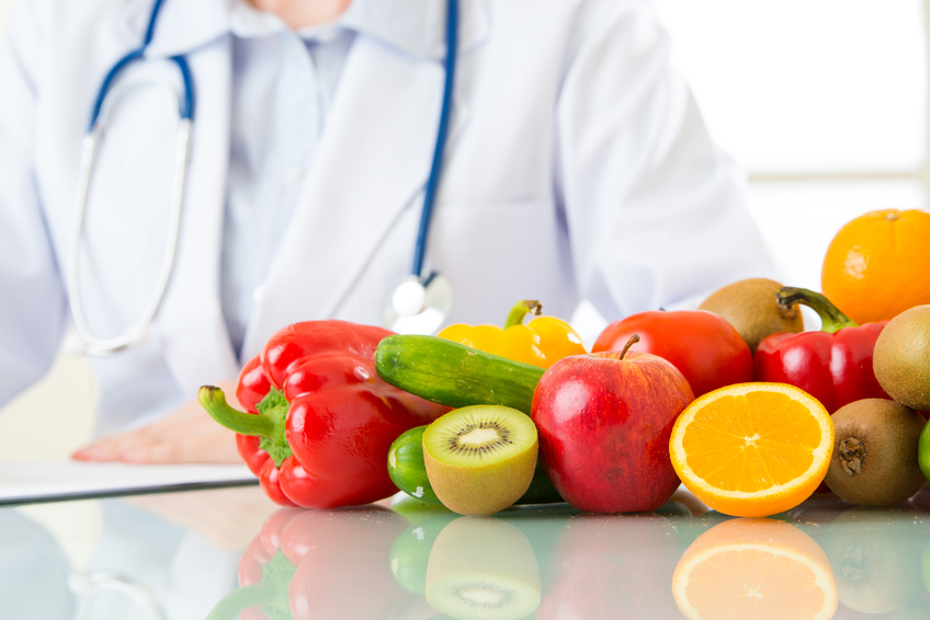 Doctor nutritionist with fruits and vegetable